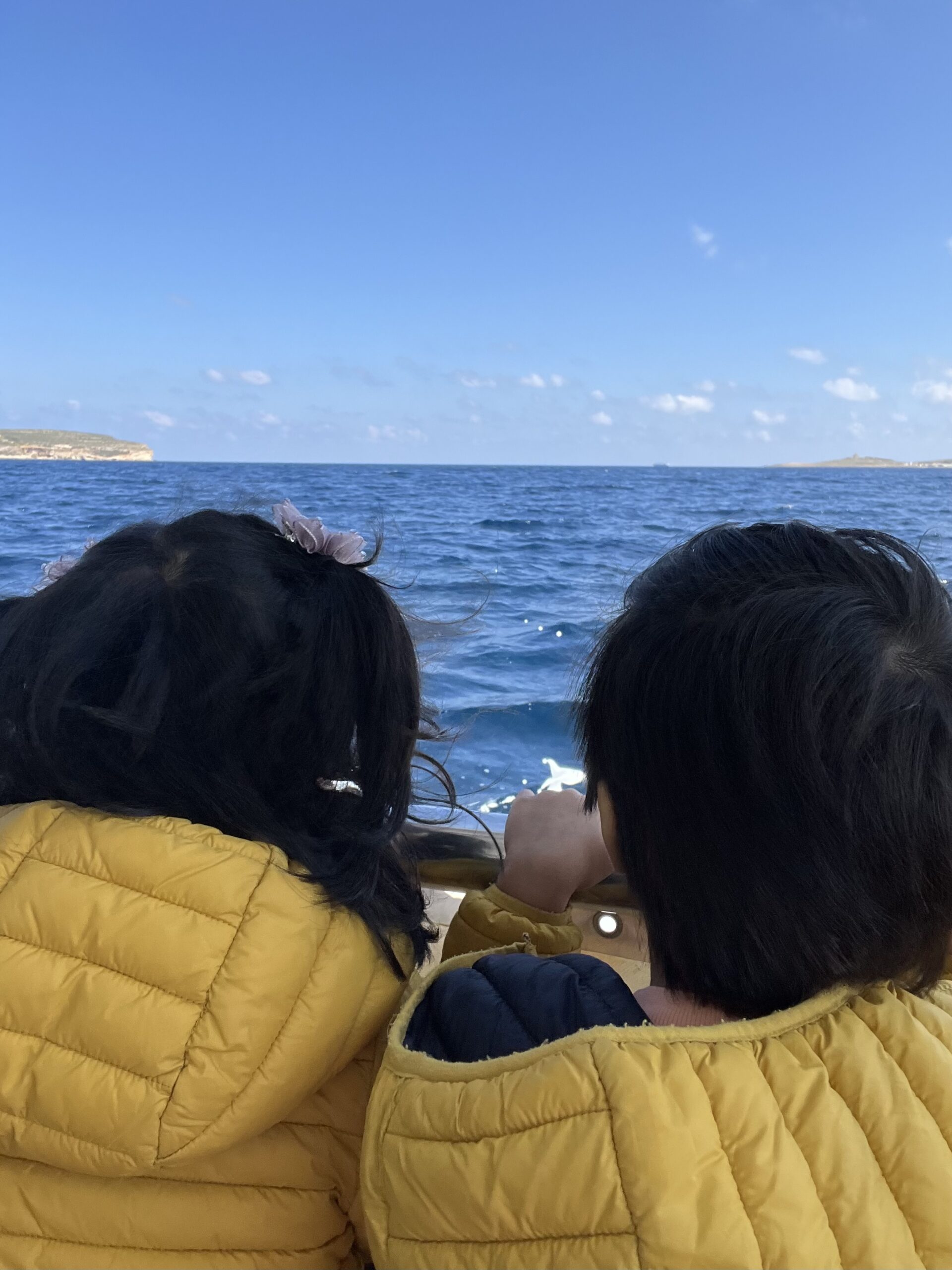 Kids enjoying ferry; visiting Comino island in Malta