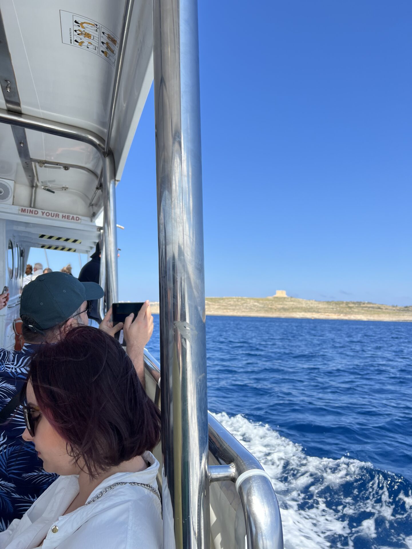 Ferry from Cirkewwa to Comino; visiting Comino island in Malta