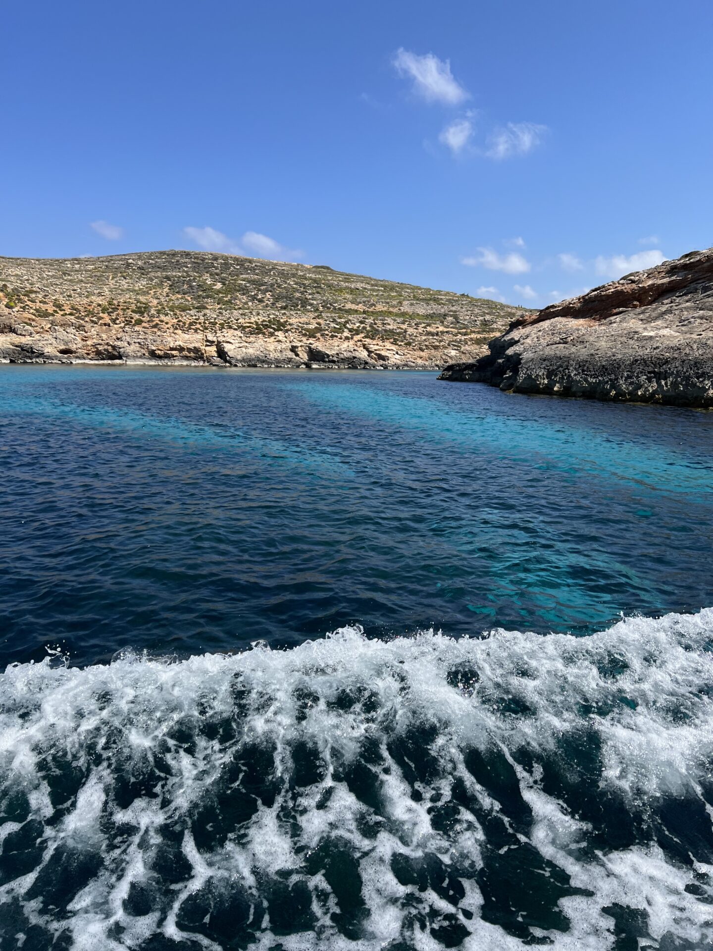 visiting Comino island in Malta By ferry; blue green sea